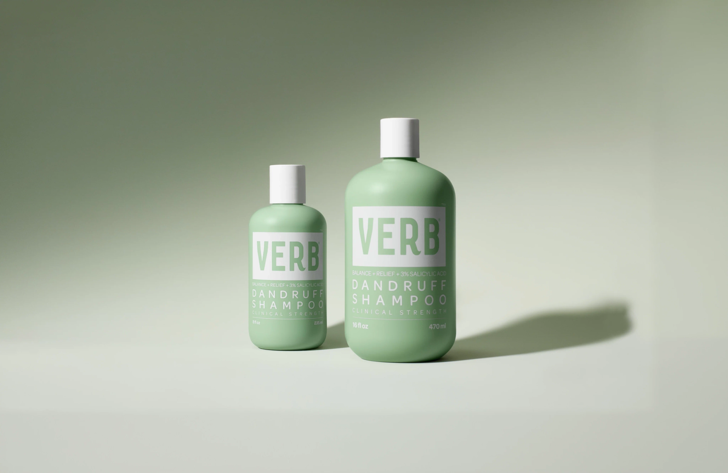 Dandruff shampoo and conditioner in green bottles